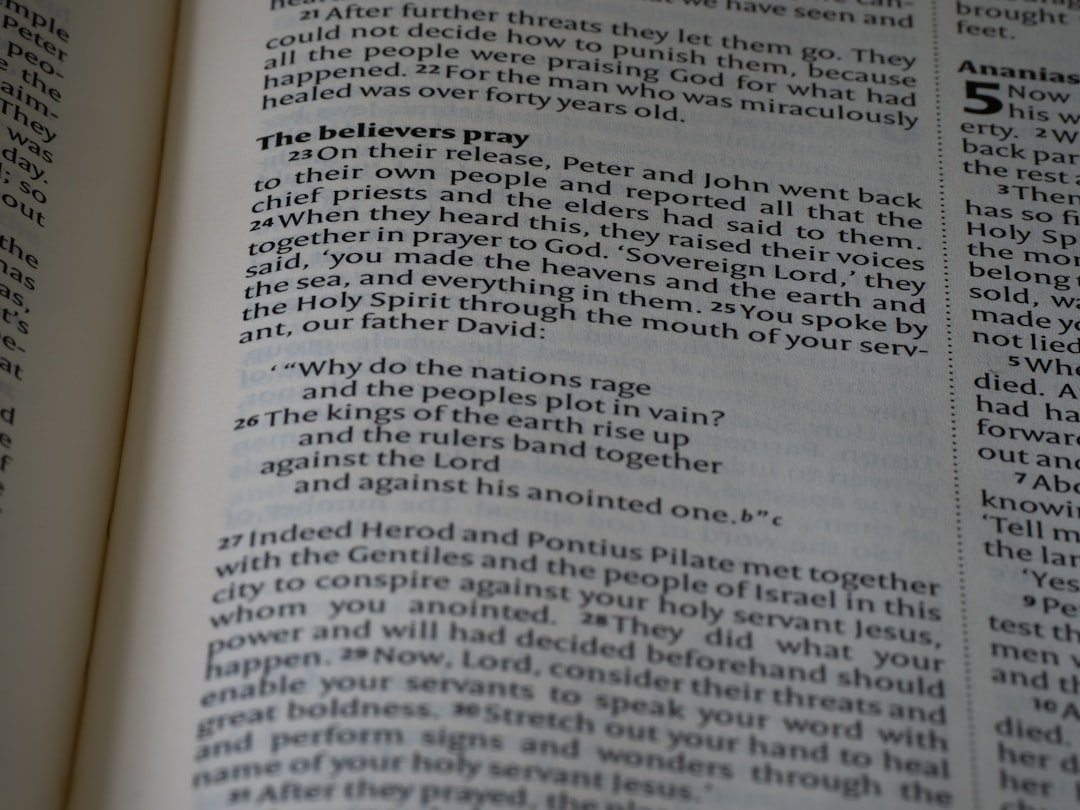 A close up of an open book with text