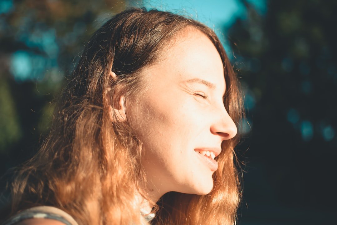 close-up photo of smiling woman