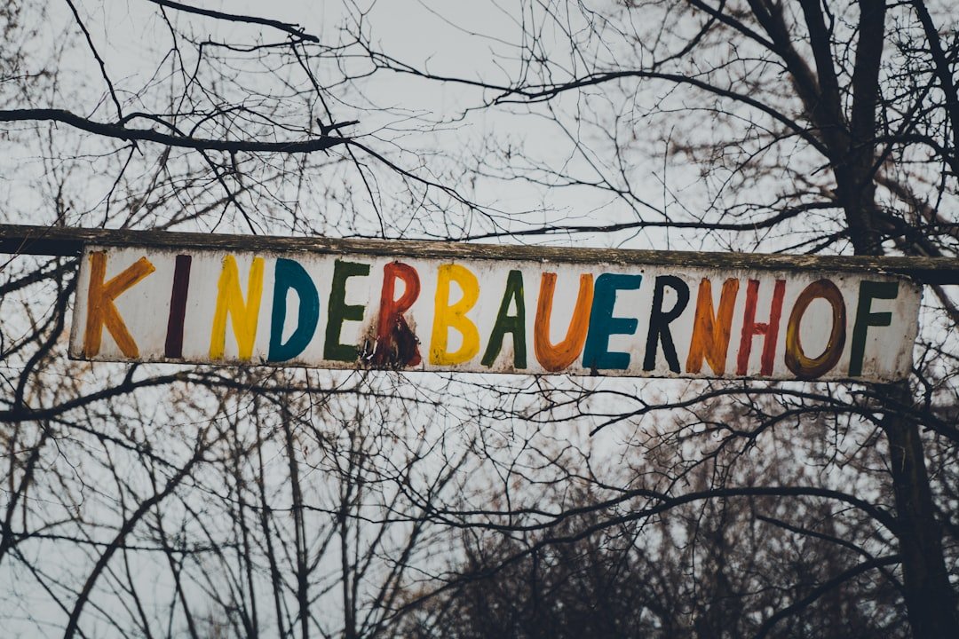 brown and white wooden signage
